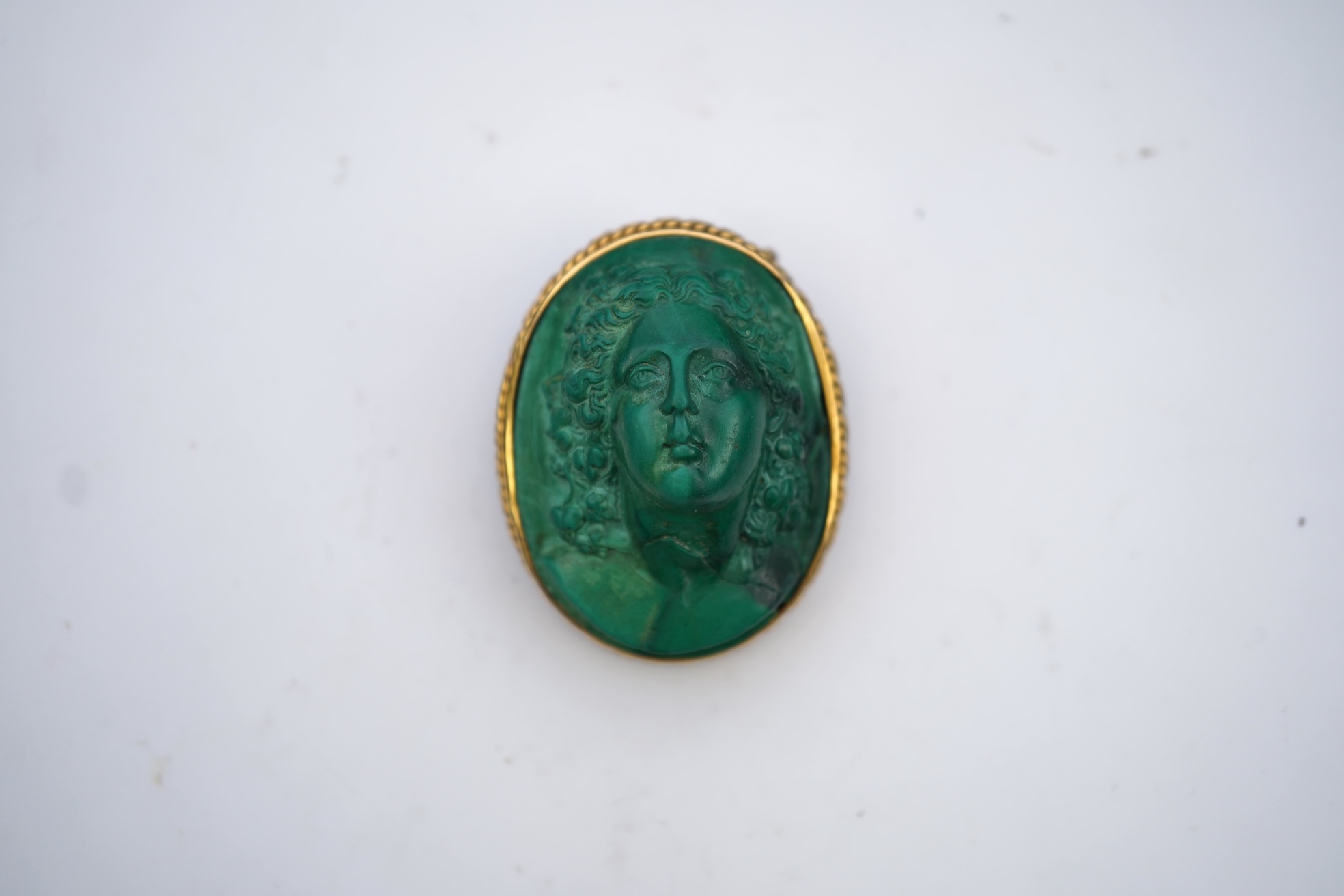A malachite cameo brooch, mid 19th century